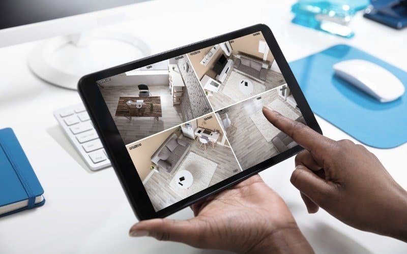 monitoring cctv footage on tablet